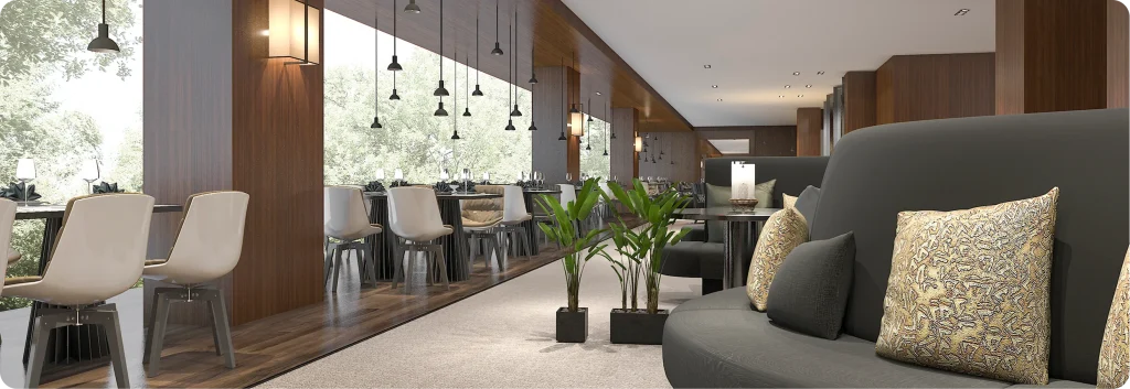 Clean hotel lounge area with comfortable seating and tables
