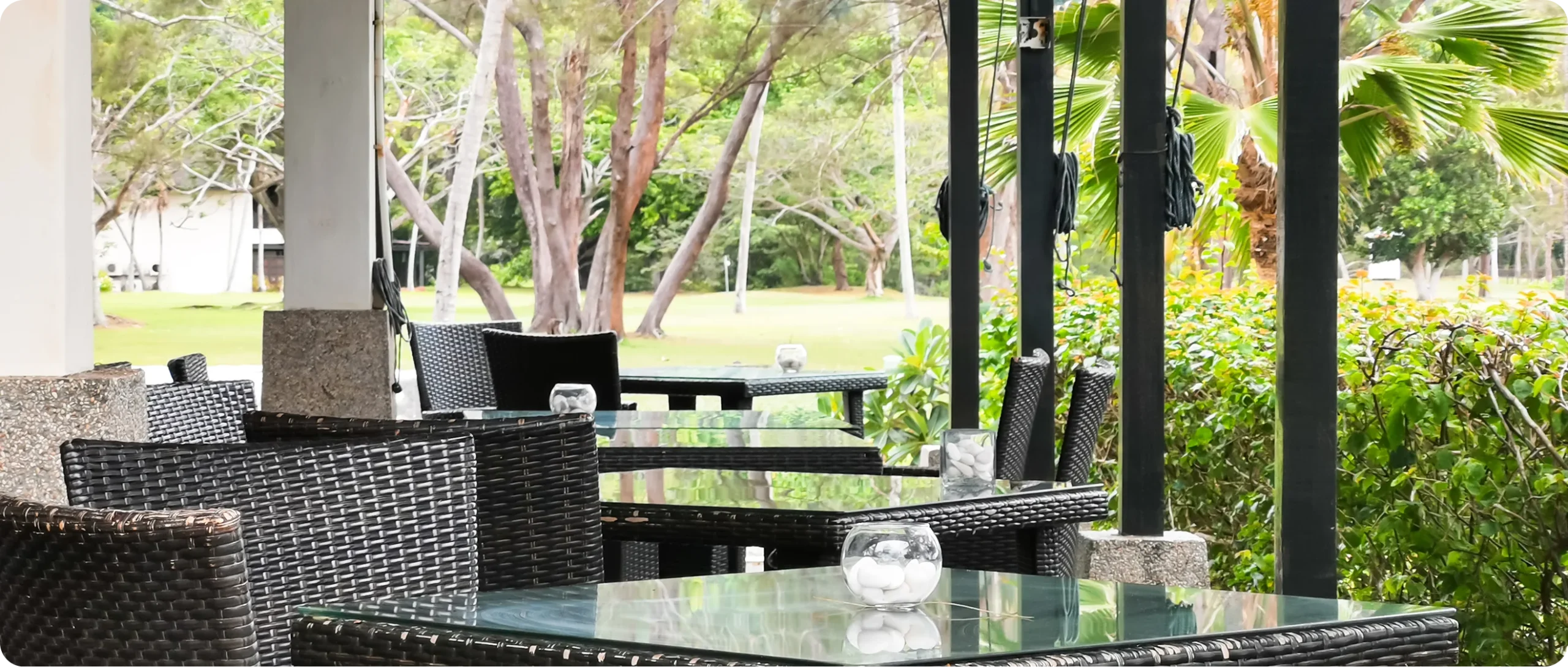 Well-maintained resort patio dining space with organised seating