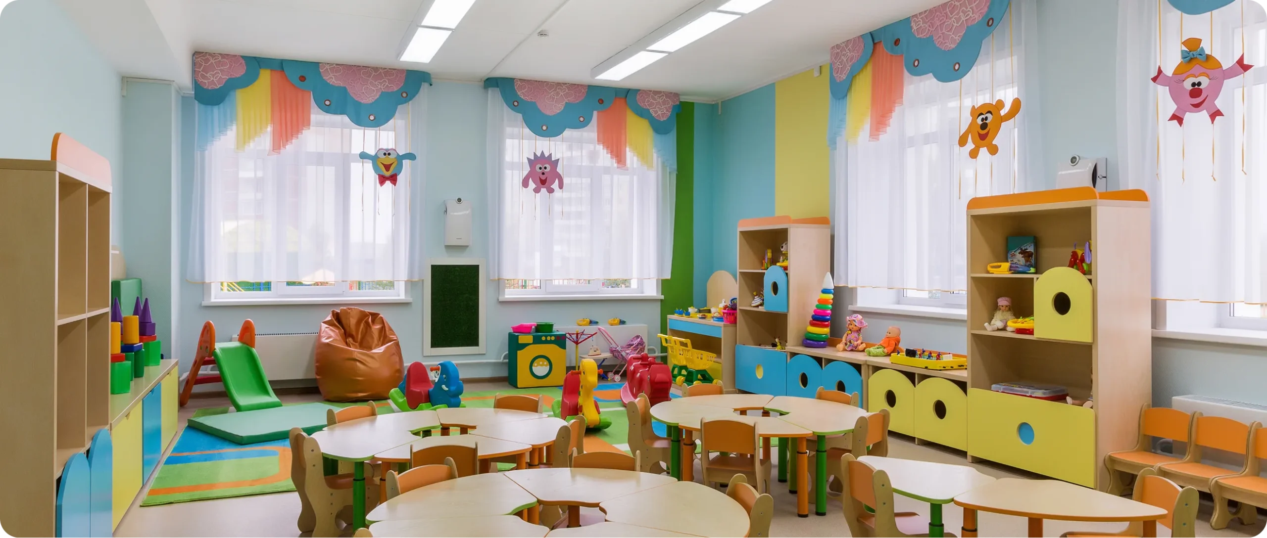 Sanitised childcare learning space with colourful furniture